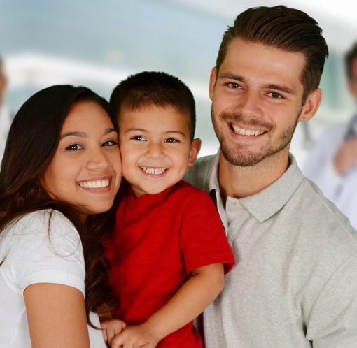 Group of doctors and a family set in a hospital